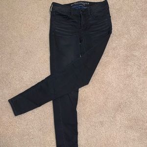 skinny black denim jeans by American Eagle